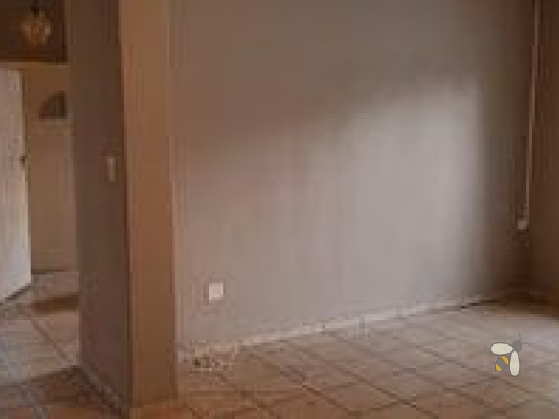 Secunda Central, investment property, 3 homes for sale, triplex, rental income, multi-generational living, 7 bedrooms total, private yards, carports, financial potential.