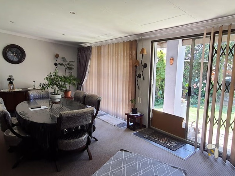 Standerton Central, luxurious home for sale, 4 bedroom house, Jacuzzi bath, open-plan living, built-in braai, 3 garages, 3 carports, income potential, water tank, well-maintained.