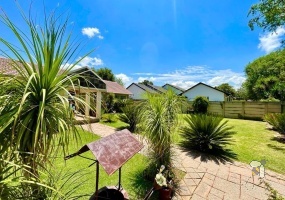 Secunda, 3 bedroom house for sale, centrally located, indoor entertainment, built-in braai, Rhodesian teak bar, granite tops, gas hob, double garage, wendy house, well maintained.