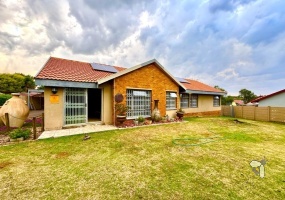 Secunda, modern family home, 4 bedroom house for sale, solar power, inverter system, JoJo tank, built-in braai, entertainer\'s carport, PVC ceilings, touch-screen stove, double garage.