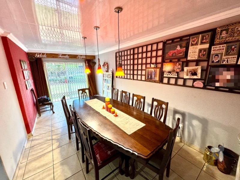 Secunda, modern family home, 4 bedroom house for sale, solar power, inverter system, JoJo tank, built-in braai, entertainer\'s carport, PVC ceilings, touch-screen stove, double garage.