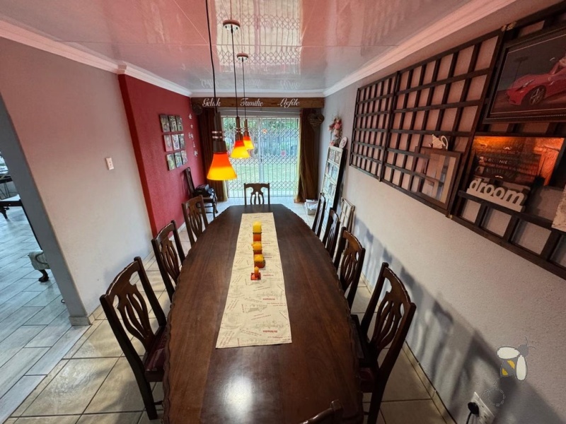 Secunda, modern family home, 4 bedroom house for sale, solar power, inverter system, JoJo tank, built-in braai, entertainer\'s carport, PVC ceilings, touch-screen stove, double garage.