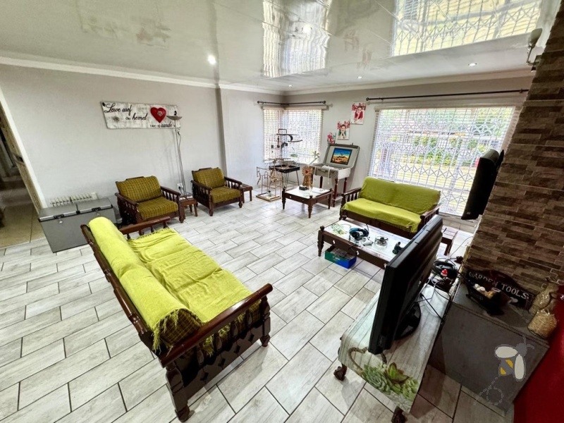 Secunda, modern family home, 4 bedroom house for sale, solar power, inverter system, JoJo tank, built-in braai, entertainer\'s carport, PVC ceilings, touch-screen stove, double garage.