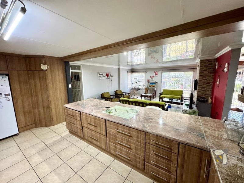 Secunda, modern family home, 4 bedroom house for sale, solar power, inverter system, JoJo tank, built-in braai, entertainer\'s carport, PVC ceilings, touch-screen stove, double garage.