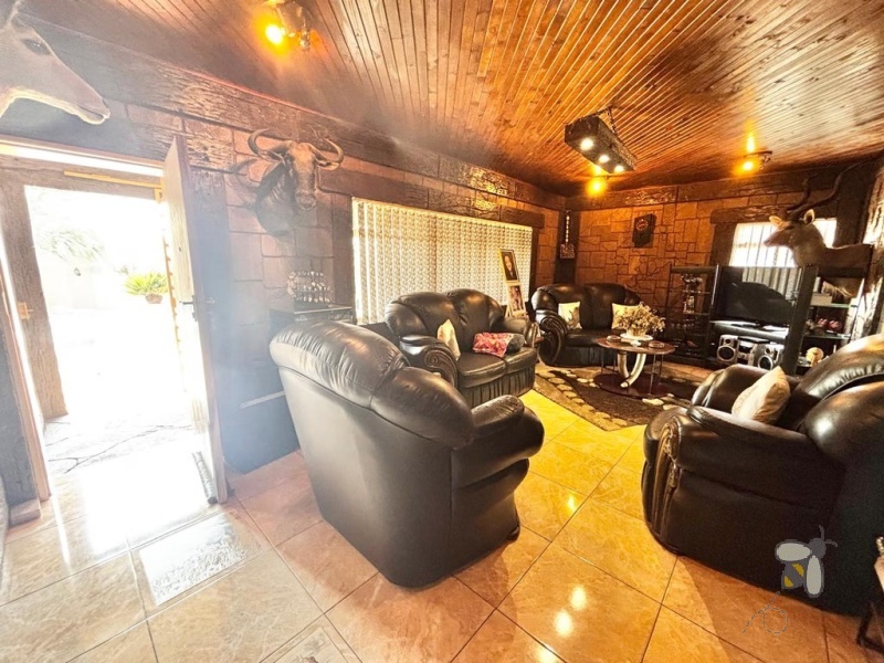 Kriel, stylish family home, 3 bedroom house for sale, swimming pool, covered lapa, built-in braai, low maintenance garden, open-plan living, move-in ready, established neighborhood.