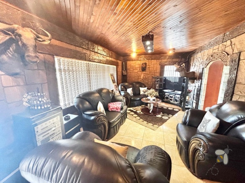 Kriel, stylish family home, 3 bedroom house for sale, swimming pool, covered lapa, built-in braai, low maintenance garden, open-plan living, move-in ready, established neighborhood.