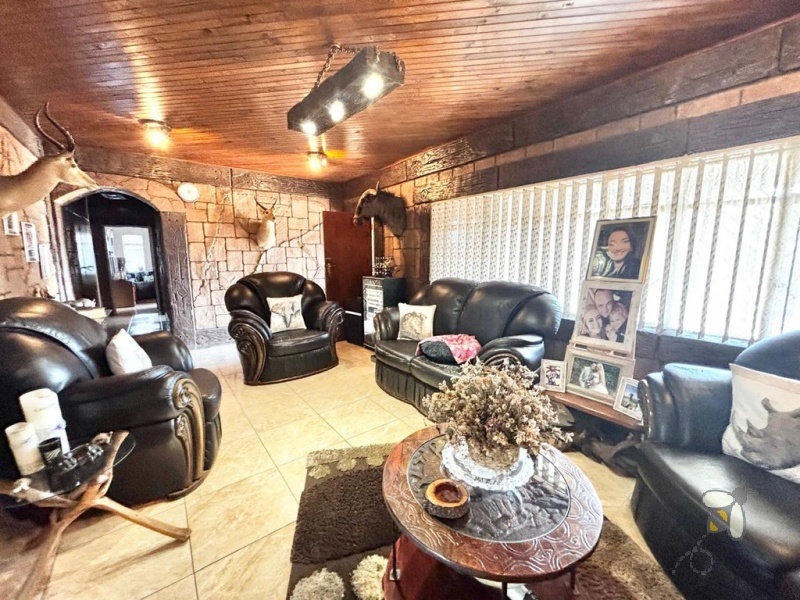 Kriel, stylish family home, 3 bedroom house for sale, swimming pool, covered lapa, built-in braai, low maintenance garden, open-plan living, move-in ready, established neighborhood.