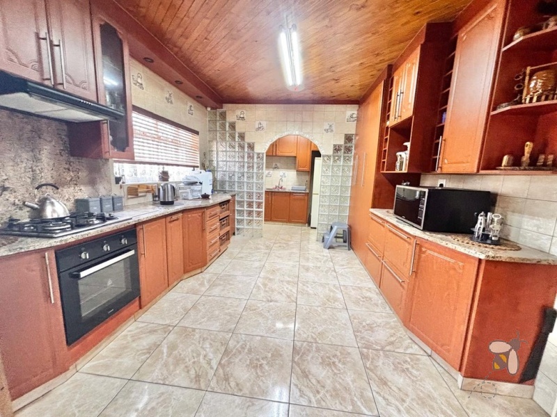 Kriel, stylish family home, 3 bedroom house for sale, swimming pool, covered lapa, built-in braai, low maintenance garden, open-plan living, move-in ready, established neighborhood.