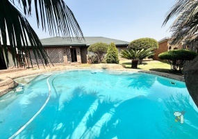 Kriel, stylish family home, 3 bedroom house for sale, swimming pool, covered lapa, built-in braai, low maintenance garden, open-plan living, move-in ready, established neighborhood.