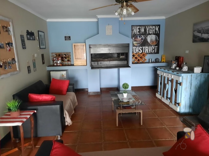 Standerton Central, 3 bedroom home for sale, braai room, indoor entertainment, dual braai areas, open-plan living, dream retreat, spacious lounge, modern living.