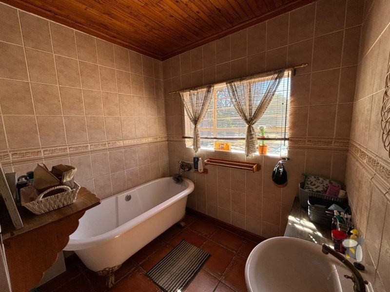 Standerton Central, 3 bedroom home for sale, braai room, indoor entertainment, dual braai areas, open-plan living, dream retreat, spacious lounge, modern living.