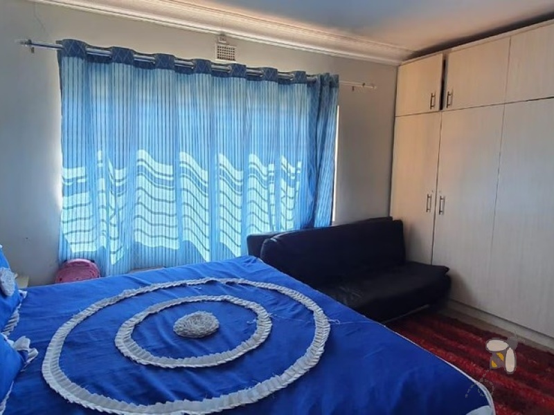 Standerton Central, investment property, 3 bedroom house, two flatlets, rental income, close to hospital, double garage, spacious kitchen, wood cupboards, guest bathrooms.