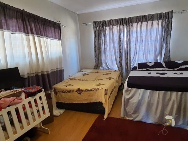 Standerton Central, investment property, 3 bedroom house, two flatlets, rental income, close to hospital, double garage, spacious kitchen, wood cupboards, guest bathrooms.