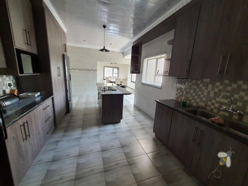 Standerton Central, 5 bedroom house for sale, newly renovated, open concept kitchen, center island, motorized garage, generator, water tank, aluminum windows, close to school.