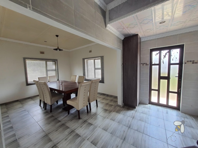 Standerton Central, 5 bedroom house for sale, newly renovated, open concept kitchen, center island, motorized garage, generator, water tank, aluminum windows, close to school.