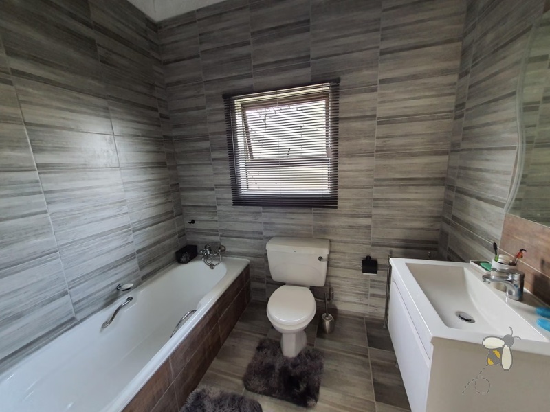 Standerton Central, 5 bedroom house for sale, newly renovated, open concept kitchen, center island, motorized garage, generator, water tank, aluminum windows, close to school.