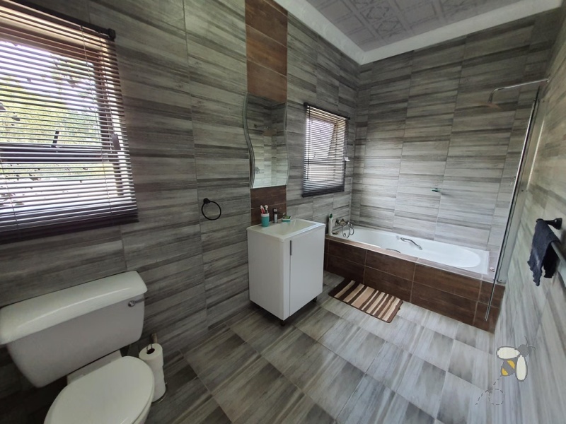 Standerton Central, 5 bedroom house for sale, newly renovated, open concept kitchen, center island, motorized garage, generator, water tank, aluminum windows, close to school.