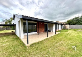 Secunda, 3 bedroom house for sale, renovated home, external room, guest suite, home office, melamine kitchen, covered patio, laminated flooring, dual entrances.