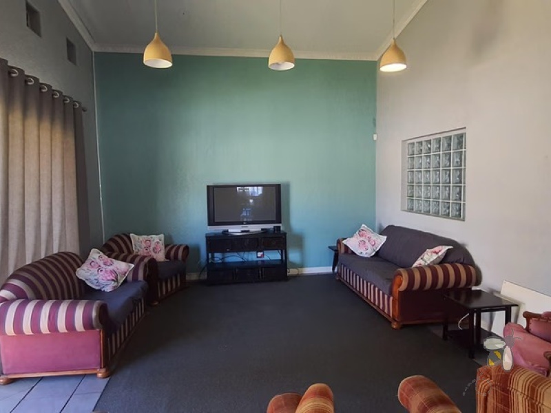 Meyerville, 4 bedroom house for sale, first time family home, two lounges, 2500L water tank, generator switch-over, double garage, 5 carports, practical laundry.