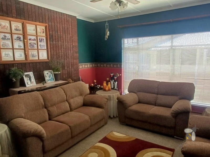 Meyerville, 3 bedroom house for sale, farm view, quiet street, built-in braai, entertainment area, inverter system, 2500L water tank, double garage, two lounges, secure porch.