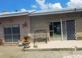 Meyerville, 3 bedroom house for sale, farm view, quiet street, built-in braai, entertainment area, inverter system, 2500L water tank, double garage, two lounges, secure porch.