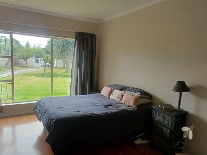 Meyerville, 4 bedroom house for sale, renovated home, laminated floors, open-plan living, inverter system, 7kW battery, eco-friendly, two garages, Laer Skool Kalie de Haas.