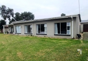 Meyerville, 4 bedroom house for sale, renovated home, laminated floors, open-plan living, inverter system, 7kW battery, eco-friendly, two garages, Laer Skool Kalie de Haas.