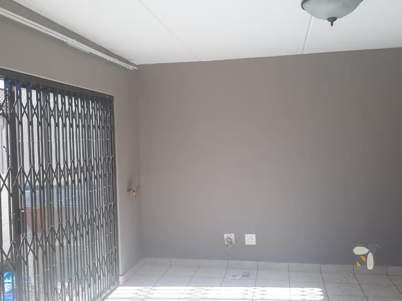 Secunda Central, 4 bedroom double storey house for sale, luxury living, walk-in closet, gas stove, electric oven, walk-in pantry, built-in braai, double garage storage, modern masterpiece.