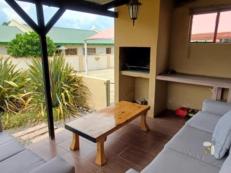Standerton Central, 3 bedroom townhouse for sale, modern living, inverter system, 2400L water tank, double garage, private garden, separate dining room, enclosed patio, Wendy house.