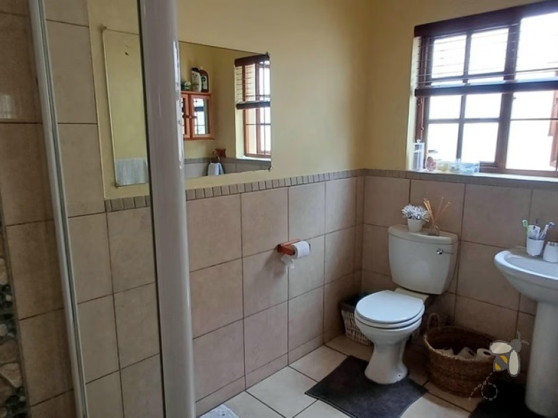 Standerton Central, 3 bedroom townhouse for sale, modern living, inverter system, 2400L water tank, double garage, private garden, separate dining room, enclosed patio, Wendy house.