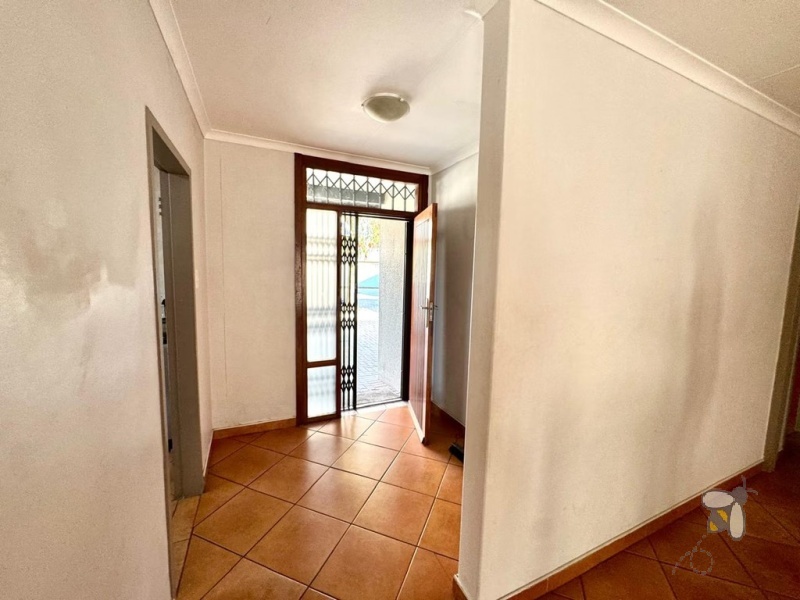 Secunda, 3 bedroom townhouse for sale, great location, granite countertops, full en-suite, double automated garage, private courtyard, two living areas, fully tiled, close to schools.