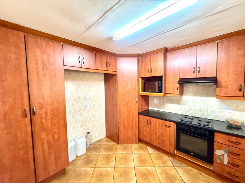 Secunda, 3 bedroom townhouse for sale, great location, granite countertops, full en-suite, double automated garage, private courtyard, two living areas, fully tiled, close to schools.