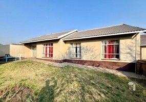 Secunda, 3 bedroom townhouse for sale, great location, granite countertops, full en-suite, double automated garage, private courtyard, two living areas, fully tiled, close to schools.