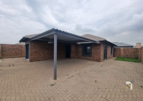 Secunda, modern family home for sale, prime location, gas hob, Trellidor security, double carport, automated gate, spacious yard, close to schools, move-in ready.