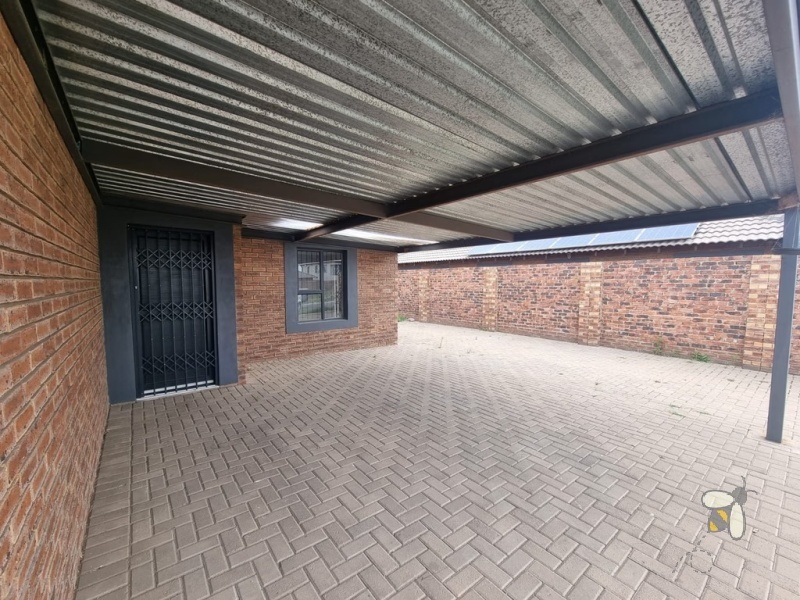 Secunda, modern family home for sale, prime location, gas hob, Trellidor security, double carport, automated gate, spacious yard, close to schools, move-in ready.