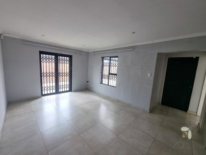 Secunda, modern family home for sale, prime location, gas hob, Trellidor security, double carport, automated gate, spacious yard, close to schools, move-in ready.