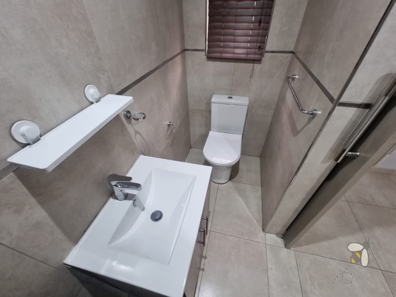 Secunda, modern family home for sale, prime location, gas hob, Trellidor security, double carport, automated gate, spacious yard, close to schools, move-in ready.