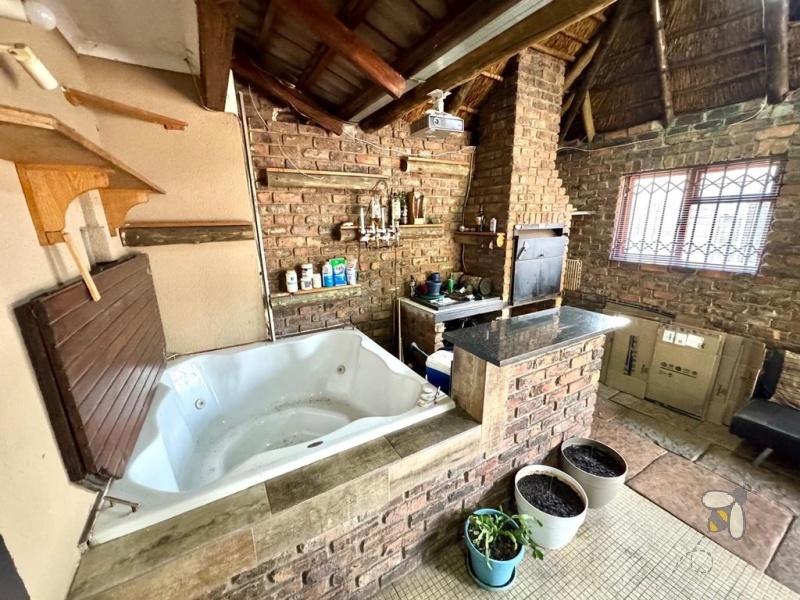 Secunda, 3 bedroom house for sale, indoor braai, heated jacuzzi, solar power, anthracite stove, JoJo tank, oak kitchen, energy efficient, double garage, family home.