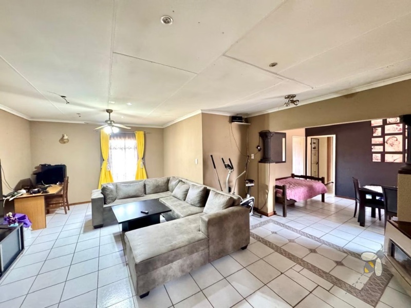 Secunda, 3 bedroom house for sale, indoor braai, heated jacuzzi, solar power, anthracite stove, JoJo tank, oak kitchen, energy efficient, double garage, family home.