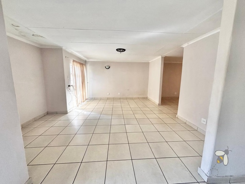 Secunda house for sale, 4 bedroom, spacious home, ample yard space, family living, dedicated dining room, prepaid electricity, garage and carport, practical layout.