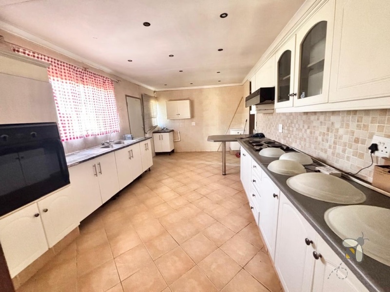 Secunda house for sale, 4 bedroom, spacious home, ample yard space, family living, dedicated dining room, prepaid electricity, garage and carport, practical layout.