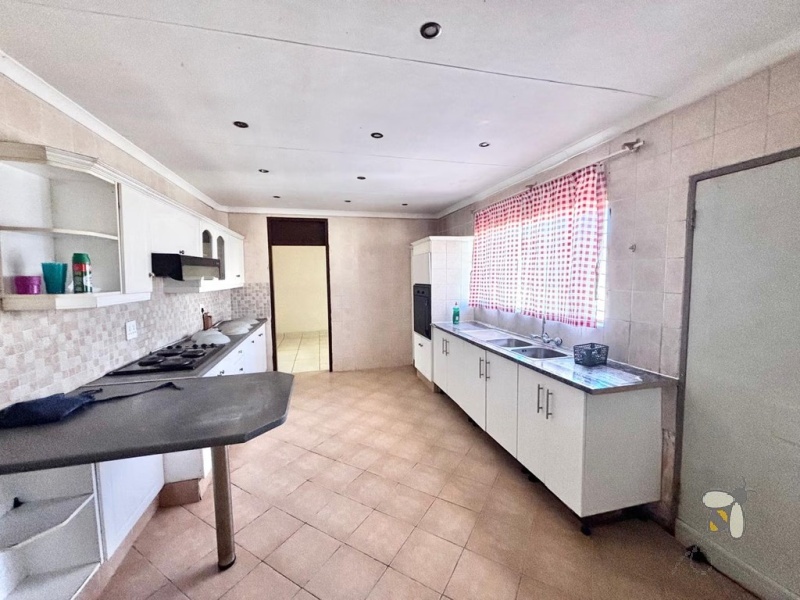 Secunda house for sale, 4 bedroom, spacious home, ample yard space, family living, dedicated dining room, prepaid electricity, garage and carport, practical layout.