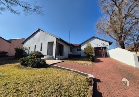 Secunda house for sale, 4 bedroom, newly painted, move-in ready, family home, electric and gas stove, open-plan living, large yard, lock-up garage, secure parking.