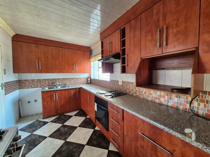 Secunda house for sale, 4 bedroom, newly painted, move-in ready, family home, electric and gas stove, open-plan living, large yard, lock-up garage, secure parking.