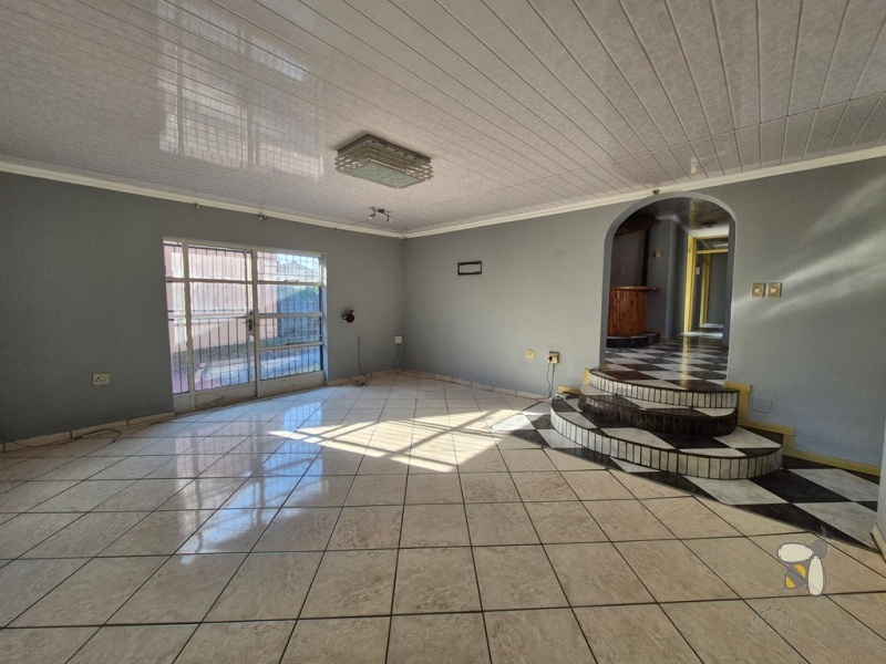 Secunda house for sale, 4 bedroom, newly painted, move-in ready, family home, electric and gas stove, open-plan living, large yard, lock-up garage, secure parking.