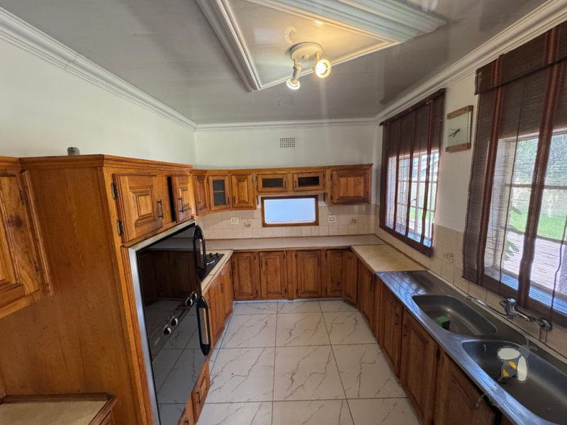 Secunda house for sale, centrally located home, fully tiled, double eye-level oven, three bedroom house, en-suite bathroom, single garage, R1,260,000