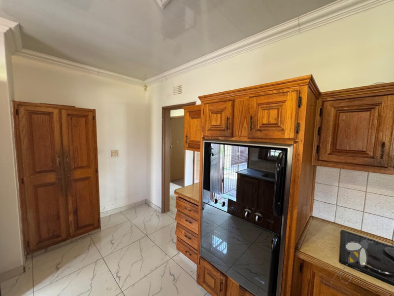 Secunda house for sale, centrally located home, fully tiled, double eye-level oven, three bedroom house, en-suite bathroom, single garage, R1,260,000