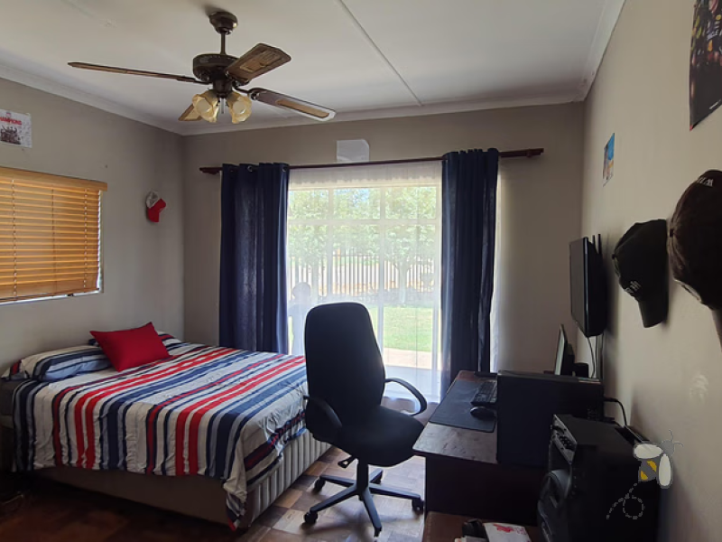 Frankfort 4 bedroom home, well maintained, spacious yard, open plan living, double beds, water tank, built-in wardrobes, starter home