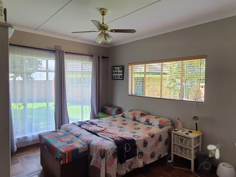 Frankfort 4 bedroom home, well maintained, spacious yard, open plan living, double beds, water tank, built-in wardrobes, starter home