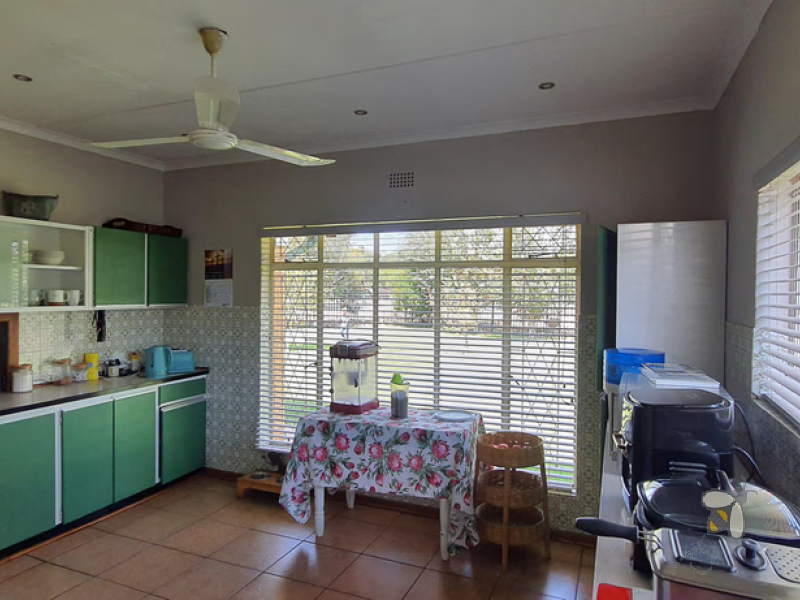 Frankfort 4 bedroom home, well maintained, spacious yard, open plan living, double beds, water tank, built-in wardrobes, starter home